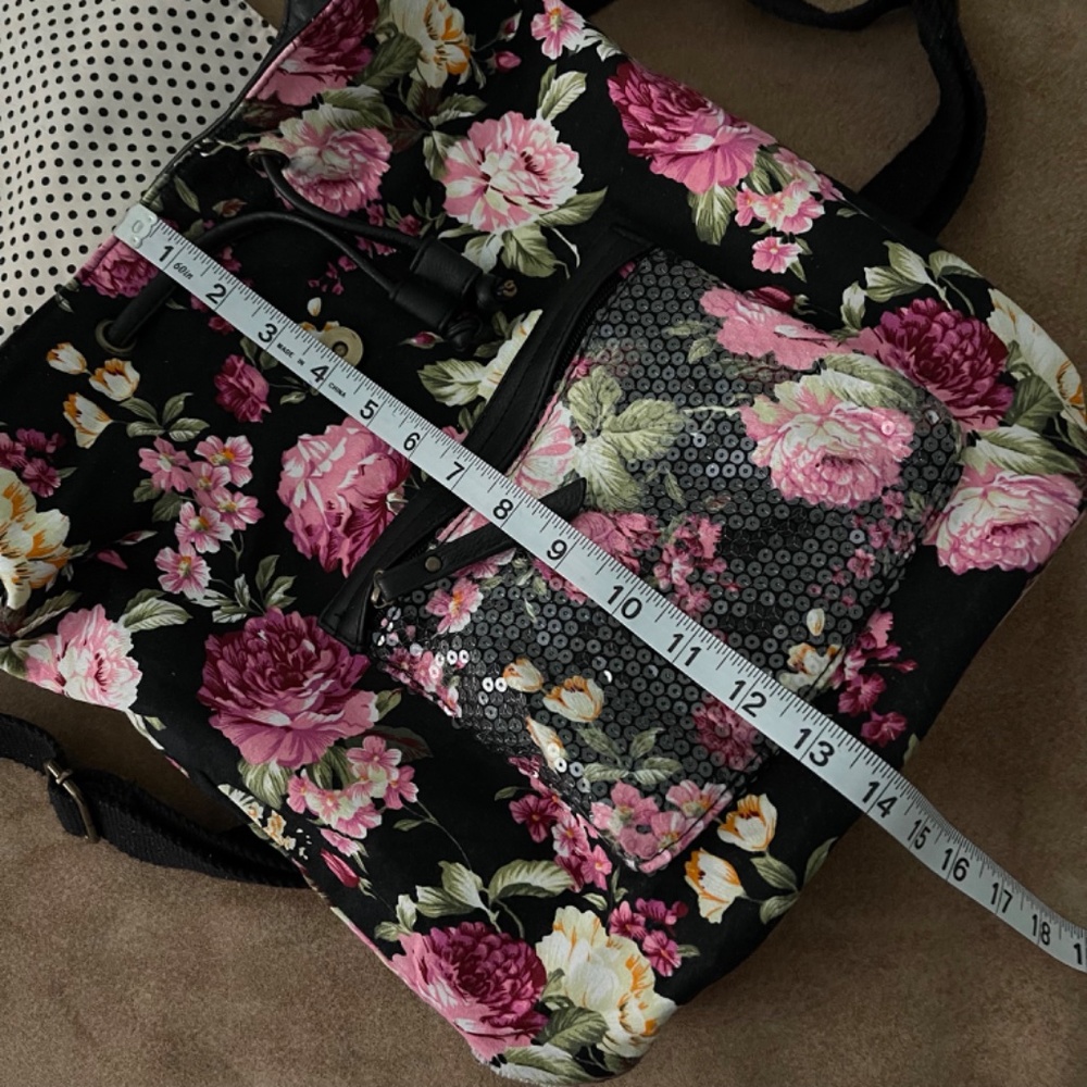 Madden Girl Black Floral Backpack with Polka Dot Interior - Picture 12 of 16